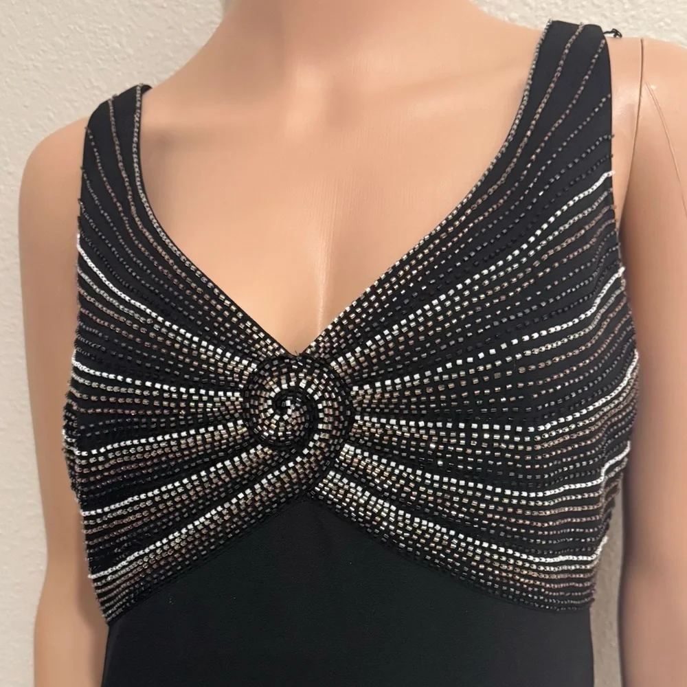 Stunning black Daymor Couture evening dress featuring intricate beaded detail. - Picture 5 of 6